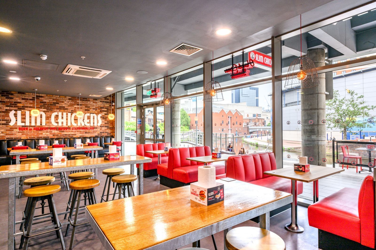 Restored banquette seating at Slim Chickens