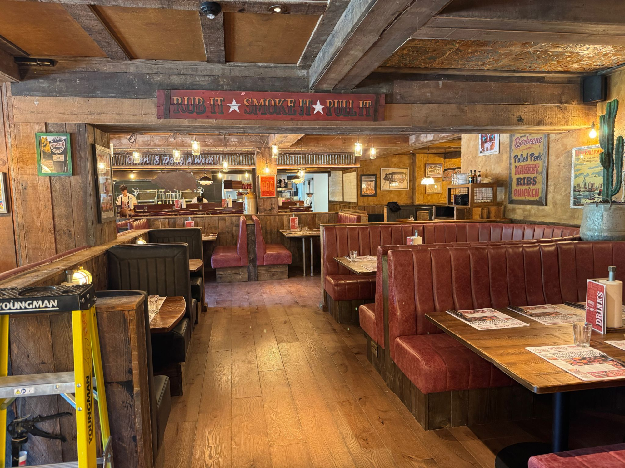 Leather banquette seating at Hickory’s Smokehouse