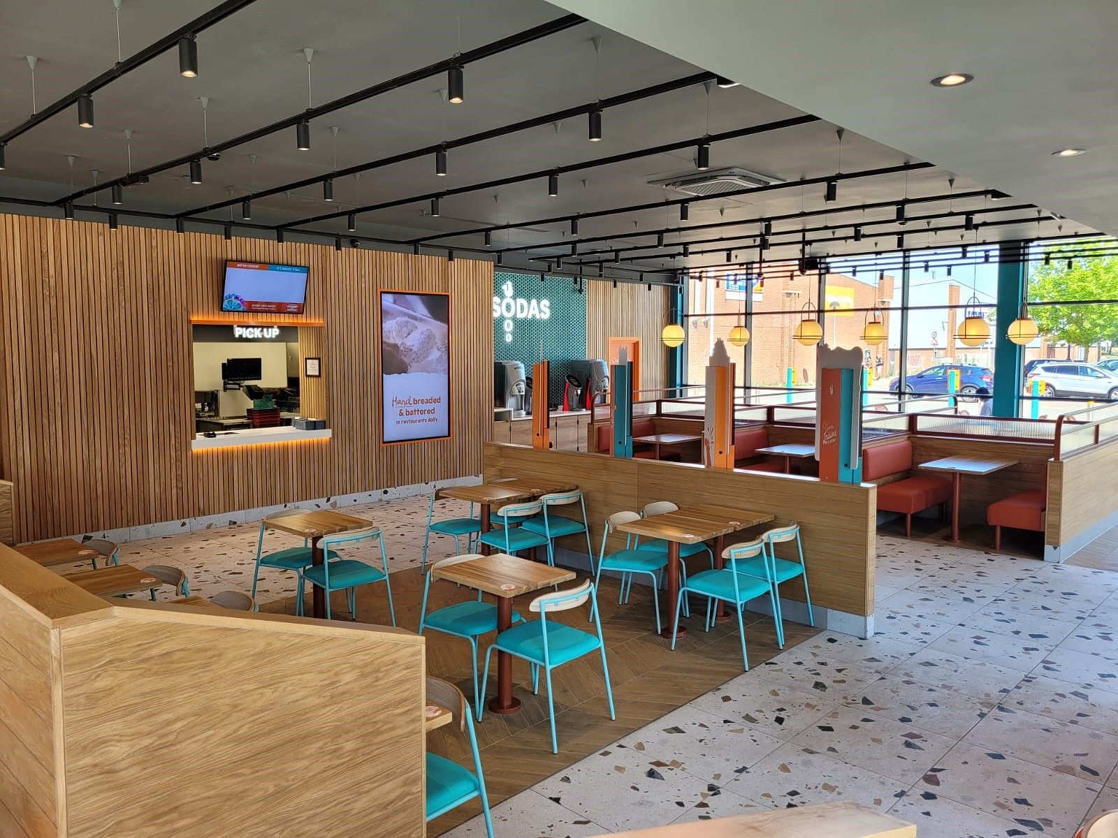 Fixed and loose restaurant furniture at Popeyes UK